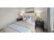Cozy bedroom with window, neutral decor, and two nightstands at 2209 Fletchers Ridge Dr, Durham, NC 27703