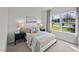 Cozy bedroom with large window and window seat at 2209 Fletchers Ridge Dr, Durham, NC 27703