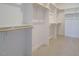 Large walk-in closet with ample shelving and hanging space at 1612 Level Stream Dr, Wendell, NC 27591