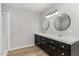 Bathroom with double vanity and large mirrors at 2113 Eveton Ln, Sanford, NC 27330