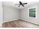 Spacious bedroom featuring wood-look floors and a window at 2113 Eveton Ln, Sanford, NC 27330