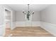 Spacious dining area with chandelier and door to backyard at 2113 Eveton Ln, Sanford, NC 27330