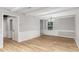 Light-filled dining room with hardwood floors and exposed beams at 2113 Eveton Ln, Sanford, NC 27330