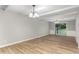 Dining room with hardwood floors and sliding glass doors to patio at 2113 Eveton Ln, Sanford, NC 27330