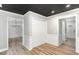 Bright entryway with updated flooring and a view into the dining room at 2113 Eveton Ln, Sanford, NC 27330