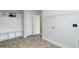 Laundry room with built-in shelving and storage at 84 Rosslyn Way # 92, Garner, NC 27529