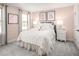 Charming bedroom with a queen-size bed and soft color scheme at 1025 Country Pasture Cv, Wendell, NC 27591