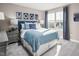 Bedroom with a full-size bed and a navy blue and white color scheme at 1025 Country Pasture Cv, Wendell, NC 27591
