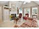 Spacious living room with a fireplace and built-in shelving at 107 Knottingham Ct, Dunn, NC 28334
