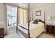 Nicely sized bedroom with a post bed and large window at 107 Knottingham Ct, Dunn, NC 28334