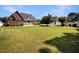 Brick house with large backyard and detached garage at 107 Knottingham Ct, Dunn, NC 28334