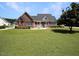 Brick house with patio and spacious backyard at 107 Knottingham Ct, Dunn, NC 28334