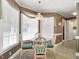 Cozy breakfast nook with bay window and seating for four at 107 Knottingham Ct, Dunn, NC 28334