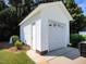 White detached garage with single door and window at 107 Knottingham Ct, Dunn, NC 28334