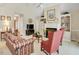 Comfortable living room featuring a fireplace and ample seating at 107 Knottingham Ct, Dunn, NC 28334