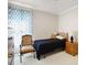 Small bedroom with a single bed and plenty of natural light at 107 Knottingham Ct, Dunn, NC 28334