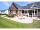 Private patio with seating area, ideal for outdoor dining at 107 Knottingham Ct, Dunn, NC 28334