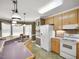 Well-equipped kitchen featuring a large island and white appliances at 107 Knottingham Ct, Dunn, NC 28334