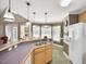 Kitchen with island, lots of counter space and stainless steel appliances at 107 Knottingham Ct, Dunn, NC 28334