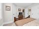 Bright bedroom with a comfortable bed and ample closet space at 3105 W Hampton Dr, Rocky Mount, NC 27804