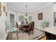 Bright breakfast nook with bay window and seating for four at 3105 W Hampton Dr, Rocky Mount, NC 27804