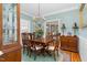 Formal dining room with hardwood floors, chandelier, and wood furniture at 3105 W Hampton Dr, Rocky Mount, NC 27804