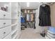 Large walk-in closet with built-in shelving and drawers at 3105 W Hampton Dr, Rocky Mount, NC 27804