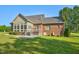 Brick house exterior with sunroom and deck at 3105 W Hampton Dr, Rocky Mount, NC 27804