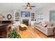 Living room features hardwood floors, fireplace, and ample natural light at 3105 W Hampton Dr, Rocky Mount, NC 27804