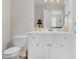 Clean bathroom with white vanity and toilet at 3105 W Hampton Dr, Rocky Mount, NC 27804