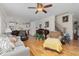 Open concept living room with hardwood floors and views into the kitchen at 3105 W Hampton Dr, Rocky Mount, NC 27804