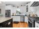 Modern kitchen with stainless steel appliances and granite countertops at 3105 W Hampton Dr, Rocky Mount, NC 27804