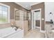 Spa-like bathroom with soaking tub and walk-in shower at 3105 W Hampton Dr, Rocky Mount, NC 27804