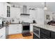 Modern kitchen with stainless steel appliances and granite countertops at 3105 W Hampton Dr, Rocky Mount, NC 27804