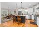 Spacious kitchen with island, stainless steel appliances, and hardwood floors at 3105 W Hampton Dr, Rocky Mount, NC 27804