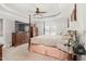 Large bedroom with post bed, dresser, and carpeting at 3105 W Hampton Dr, Rocky Mount, NC 27804