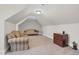 Versatile bonus room with comfy sofas, perfect for relaxation at 3105 W Hampton Dr, Rocky Mount, NC 27804