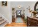 Bright and spacious entryway with hardwood floors and decorative accents at 3105 W Hampton Dr, Rocky Mount, NC 27804