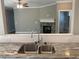 Modern kitchen sink with granite countertop and stainless steel double basin at 35 Courtland Dr, Louisburg, NC 27549