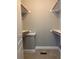 Spacious walk-in closet with double hanging rods and shelving at 35 Courtland Dr, Louisburg, NC 27549