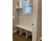 Built-in bench with storage and window seat in entryway at 35 Courtland Dr, Louisburg, NC 27549