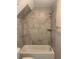 Bathroom with tub and large tiled shower at 35 Courtland Dr, Louisburg, NC 27549