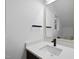 Modern bathroom with white vanity and gold fixtures at 2708 A Ashley St, Durham, NC 27704