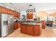 Kitchen with an island, stainless steel appliances, and ample cabinetry at 3313 Overhead Ct, Willow Springs, NC 27592