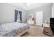 Spacious bedroom with a comfortable bed and built-in dresser at 3313 Overhead Ct, Willow Springs, NC 27592