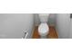 Small half bathroom with toilet and towel bar at 5107 Sandy Banks Rd, Raleigh, NC 27616
