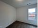 Bright bedroom with neutral walls and carpet, featuring a window with a view at 149 Greenview St, Clayton, NC 27520