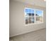 Bright bedroom featuring a large window with a view at 35 Finsbury Ct, Lillington, NC 27546