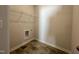 Laundry room with shelving and tile flooring at 256 Bruce Dr, Dunn, NC 28334