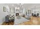 Spacious living room with hardwood floors, fireplace and built-in shelving at 122 Highclere Ln, Cary, NC 27518